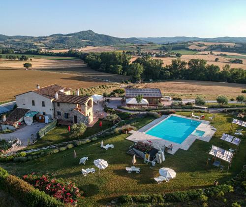 an aerial view of a villa with a swimming pool at Agriturismo San Silvestro in Marsciano
