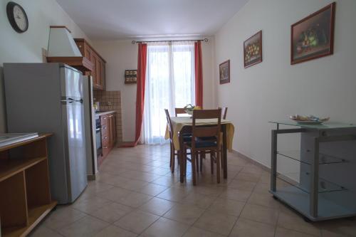 Η κουζίνα ή μικρή κουζίνα στο B&B Il Giardino di Zefiro
