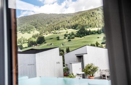 a view from a window of a building at Boutique & Gourmet Hotel Orso Grigio in San Candido
