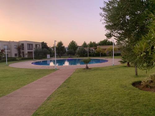 The swimming pool at or near Appartement dans le golf royal de Fes
