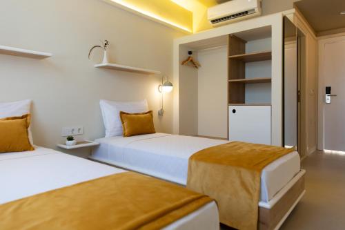 A bed or beds in a room at Oda Bodrum Gümüşlük
