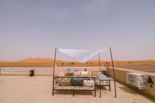 a tent in the middle of the desert at Riad Chebbi in Merzouga