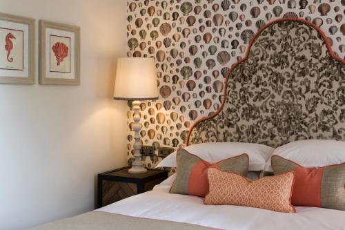 Ένα ή περισσότερα κρεβάτια σε δωμάτιο στο Beadnell Towers Hotel