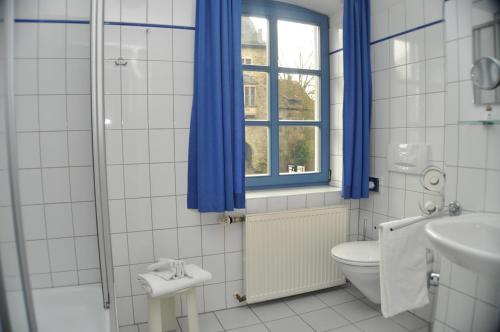 Koupelna v ubytování Hotel & Restaurant Schaumburger Ritter, Rinteln