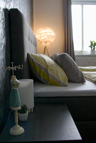 Ένα ή περισσότερα κρεβάτια σε δωμάτιο στο Luxusní Apartmán NMNM Family