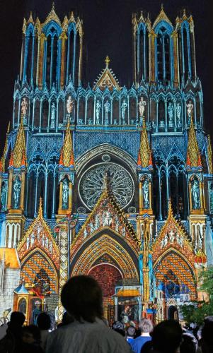 a large cathedral with people standing in front of it at Ibis Styles Reims Centre in Reims