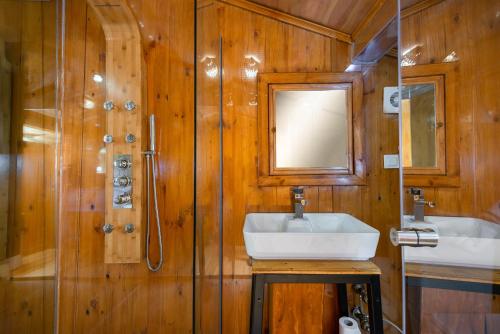 a bathroom with a sink and a shower at Wonder Wood Hotel in Istanbul