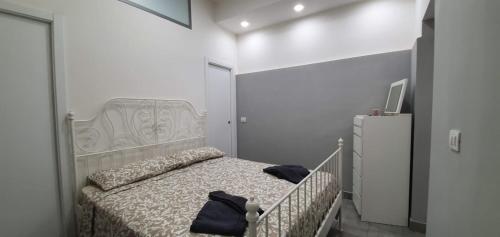 Postel nebo postele na pokoji v ubytování Sky house Napoli