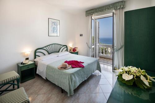 Кровать или кровати в номере Hotel Terme Park Imperial