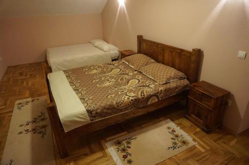 Postel nebo postele na pokoji v ubytování Toholj