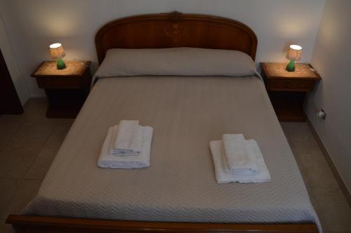 A bed or beds in a room at Casa Vacanze La Foggia