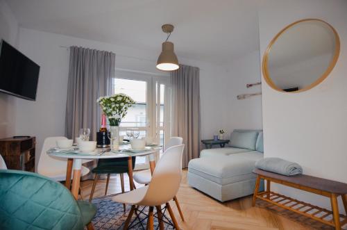 Posedenie v ubytovaní Apartamenty Piaskowe B21 z tarasem na dachu