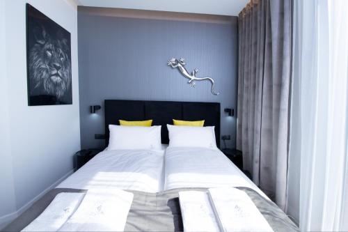 Posteľ alebo postele v izbe v ubytovaní Apartament Lagarto