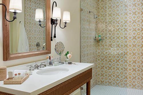 a bathroom with a sink and a shower at Indian Springs Resort & Spa in Calistoga