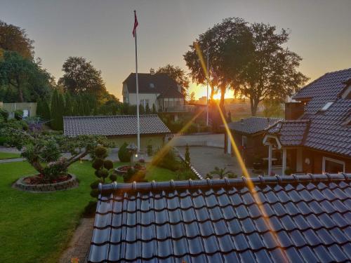 a view of a house from the roof of a yard at Casa Mundo Bed & Breakfast in Vejle