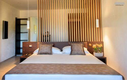 a bedroom with a large bed in a room at San Severino Park Hotel & SPA, BW Signature Collection in Mercato San Severino