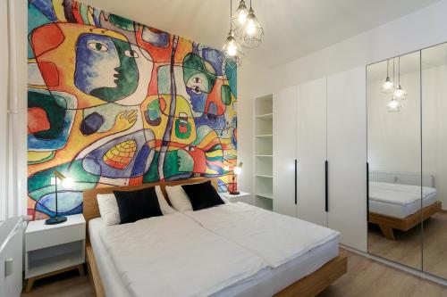 Postel nebo postele na pokoji v ubytování Avantgarde apartments