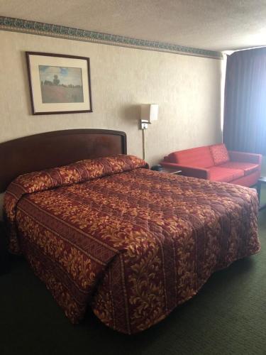 Krevet ili kreveti u jedinici u objektu Fairborn Hotel and Inn