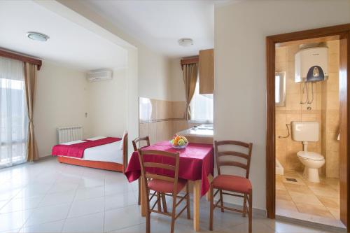 Koupelna v ubytování Apartments Konte