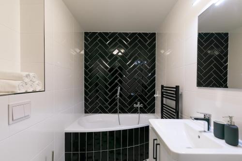 Kylpyhuone majoituspaikassa Avantgarde apartments
