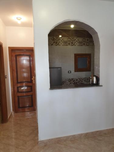 Una cocina o cocineta en Basmatic Nubian Guest House