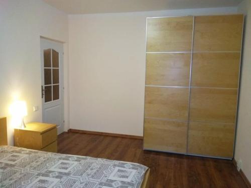 En eller flere senger på et rom på Apartments Česká
