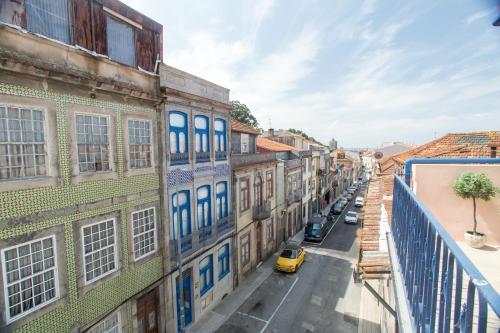 a view of a city street with buildings at Picasso Suites Porto by PCH in Porto