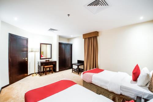 Кровать или кровати в номере ITLALA ALSHARQ FOR SERVICED APARTMENTs