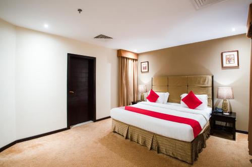 Кровать или кровати в номере ITLALA ALSHARQ FOR SERVICED APARTMENTs