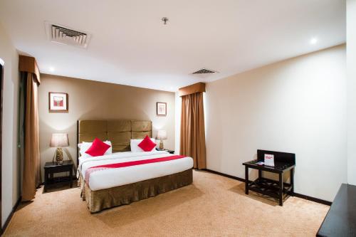 Кровать или кровати в номере ITLALA ALSHARQ FOR SERVICED APARTMENTs