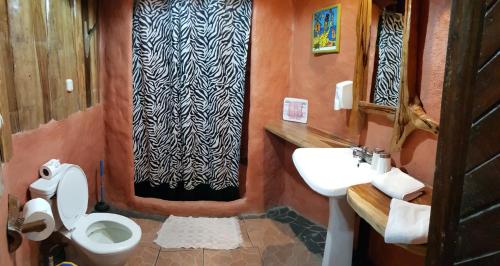 Ванная комната в Hotel La Costa de Papito