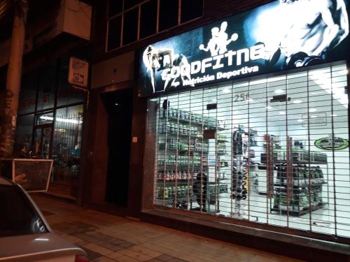 a store front of a store with a display window at Danny ap - Amplio y cómodo - 18 min Aeropuerto - Zona de Restos - Parking in Monte Grande