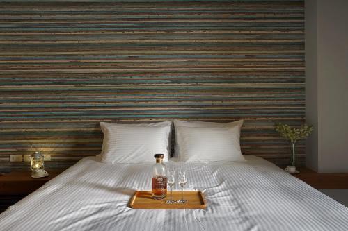 Ein Bett oder Betten in einem Zimmer der Unterkunft Sun Moon Lake Blue Sky Bay B&B