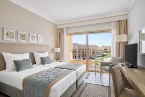 Cama o camas de una habitación en JAZ Elite Maraya