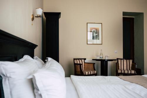 Postel nebo postele na pokoji v ubytování Drachenhaus