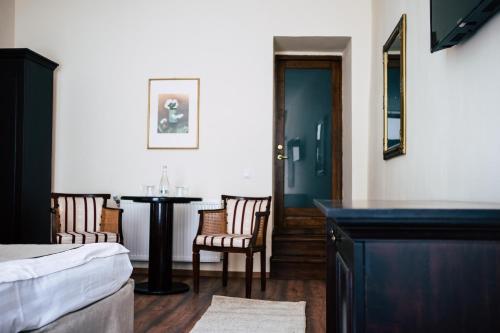 Postel nebo postele na pokoji v ubytování Drachenhaus