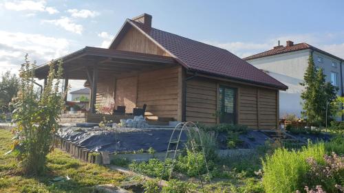a house being remodeled with a roof at Agroturystyka u Joli in Pacanów