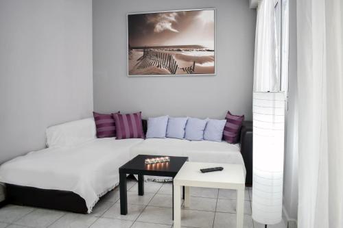 Posteľ alebo postele v izbe v ubytovaní OLIVER SUITES