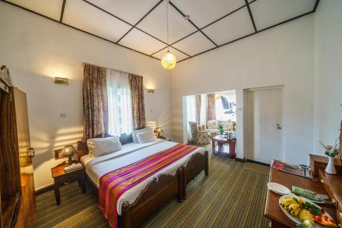 Postel nebo postele na pokoji v ubytování Hotel Glendower