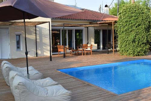 Bazén v ubytování Serenity Luxury Villa, Skiathos nebo v jeho okolí
