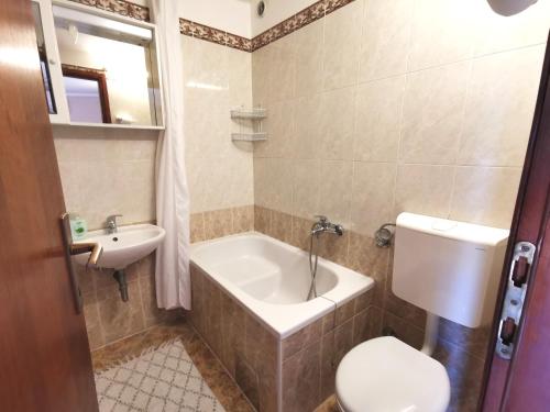 Ванная комната в Apartments Villa Amaryllis