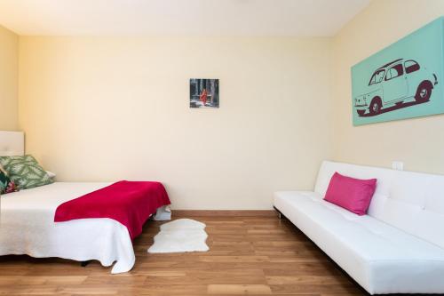 Ένα ή περισσότερα κρεβάτια σε δωμάτιο στο Home2Book Stunning Ocean Views Radazul Pool