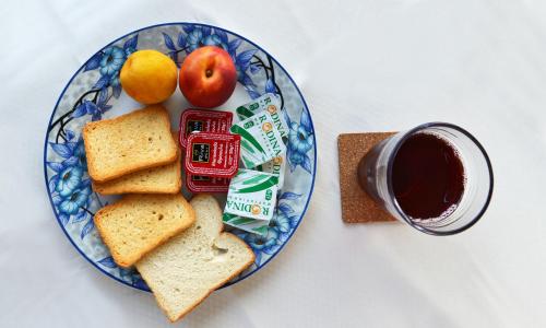 a plate with toast bread and a cup of tea at Thesshouse Pefka FK in Thessaloniki