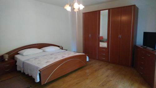 Postel nebo postele na pokoji v ubytování Apartman Franka