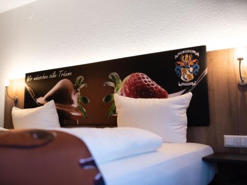 Ένα ή περισσότερα κρεβάτια σε δωμάτιο στο Hotel Conditorei Cafe Baier