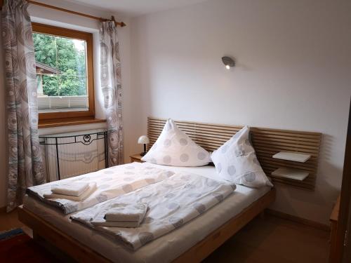 Säng eller sängar i ett rum på Haus Aschenwald
