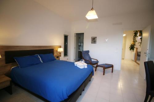 B & B LA MARMIFERAにあるベッド