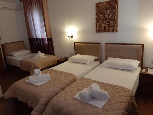 Cama o camas de una habitación en HOTEL VILA TWIX