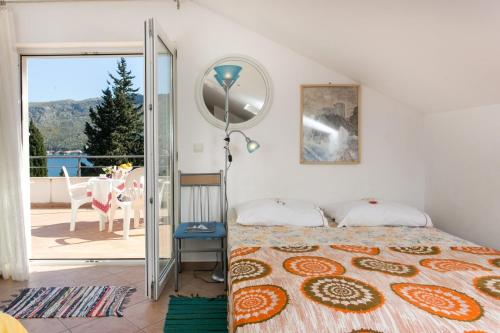 Ένα ή περισσότερα κρεβάτια σε δωμάτιο στο Apartments Marija - 50m from beach