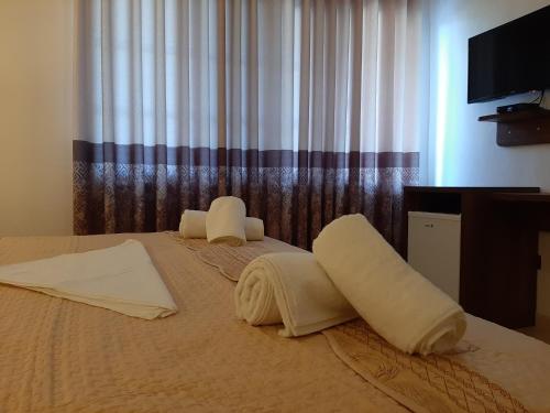 Cama o camas de una habitación en HOTEL VILA TWIX